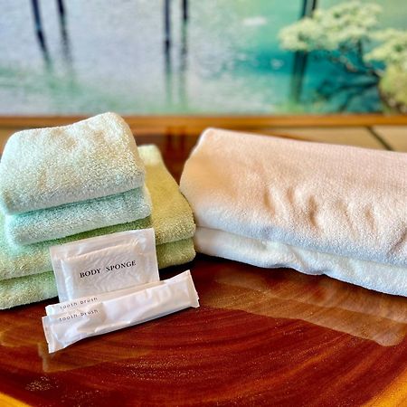 バーベキューもできる! 海と浜比嘉大橋を一望できる宿 Henza 외부 사진